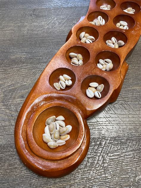 Sungka: Philippine Version of Mancala Game .